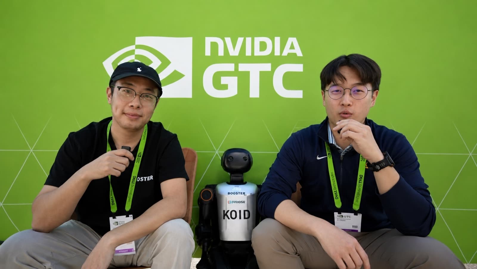 Eren Chen interviewing at NVIDIA GTC with a humanoid robot
